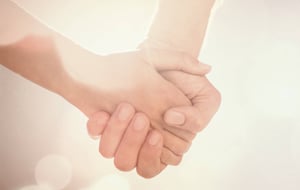 hand-in-hand-AdobeStock_cropped-small-186754221